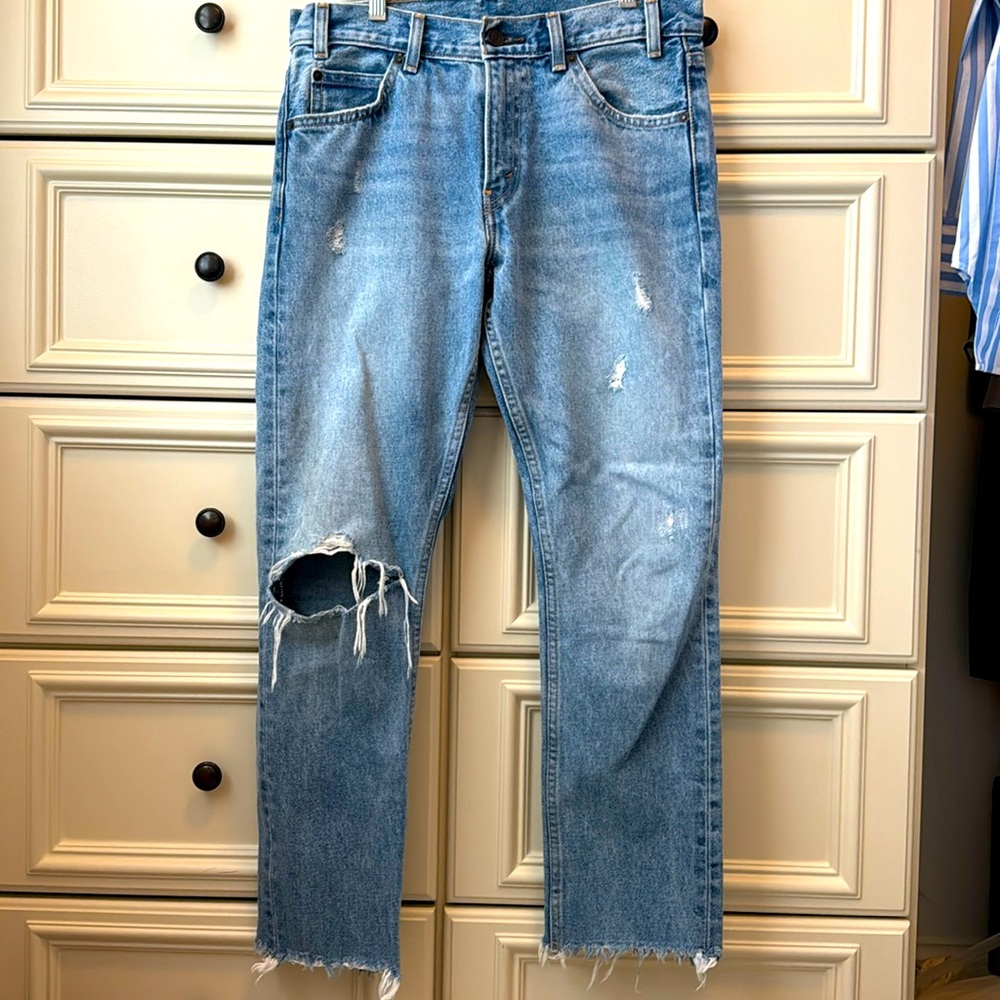 Levi 505c light wash ripped boyfriend jean. Frayed bottom. Size 28. Zip front